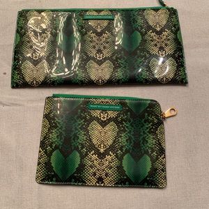 Marc Jacob small and medium cosmetic bags.